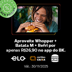 Jovem com cabelo rastafari feliz olhando para um hamburguer