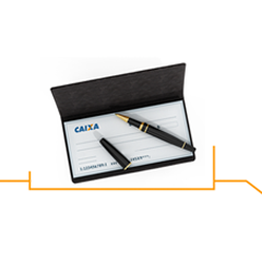 Talão de cheque com uma caneta em cima